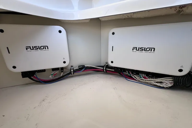 Slide: The Image of Fusion amplifiers installed in a 2022 Sea Ray Sundancer 320 Coupe Outboard boat. - 39
