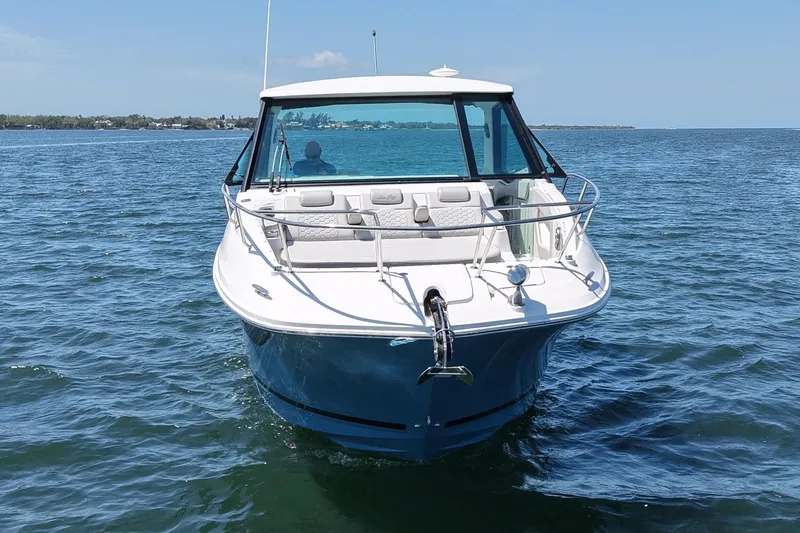 Slide: The Image of 2022 Sea Ray Sundancer 320 Coupe on open water. - 5