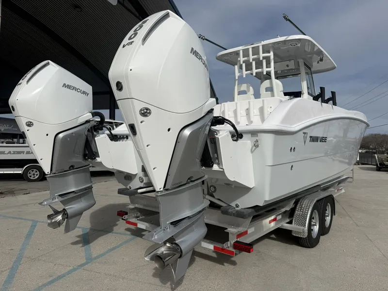 Slide: The Image of 2026 Twin Vee 280 GFX2 boat with Mercury outboard engines. - 11