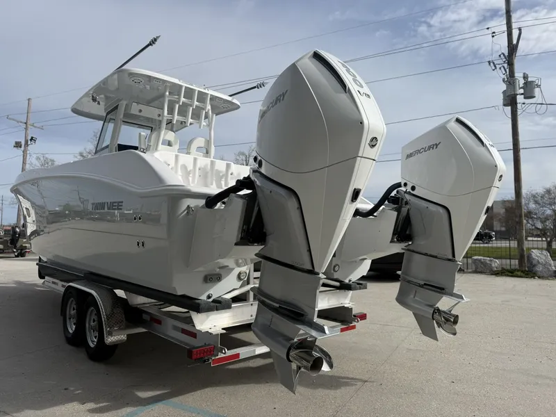 Slide: The Image of 2026 Twin Vee 280 GFX2 boat with Mercury outboard engines. - 7