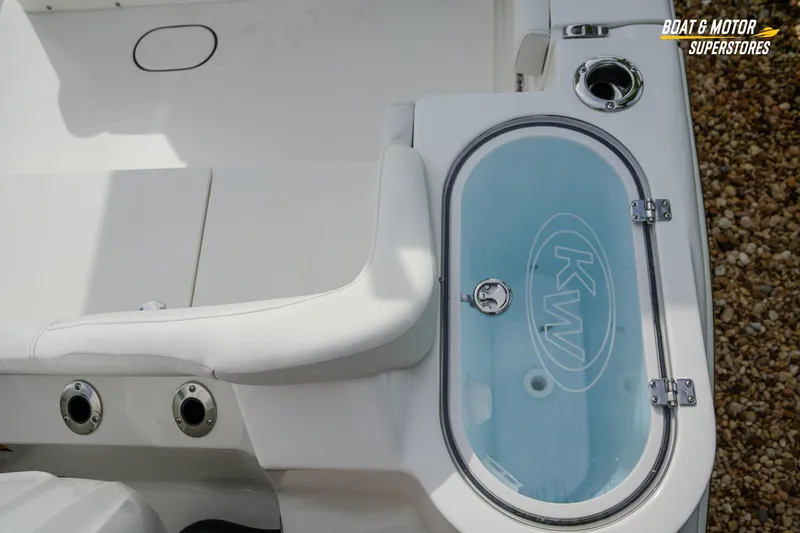 Slide: The Image of 2026 Key West 291 FS boat interior with livewell and seating area. - 11