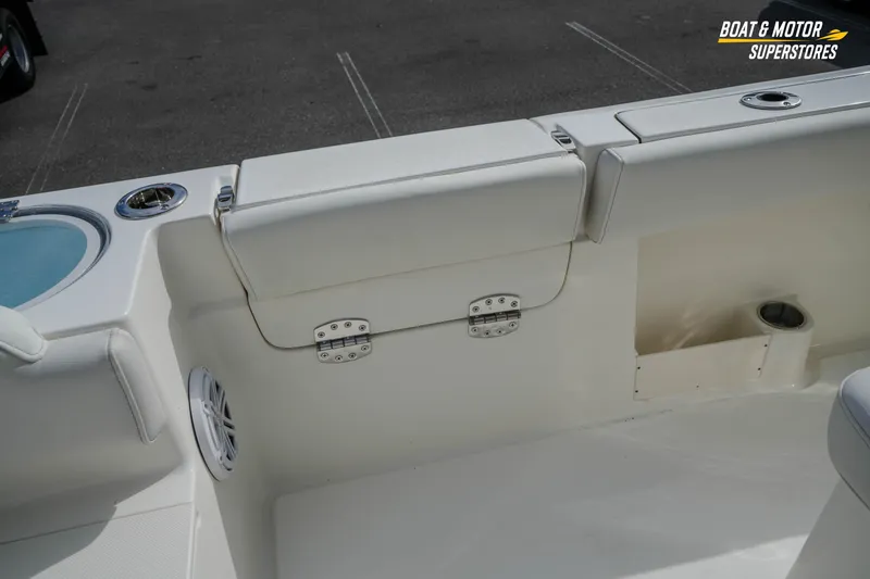 Slide: The Image of 2026 Key West 291 FS boat interior with seating and storage features. - 17