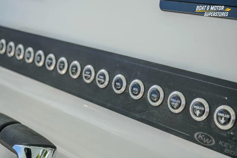 Slide: The Image of Control panel of 2026 Key West 291 FS boat with labeled buttons. - 24