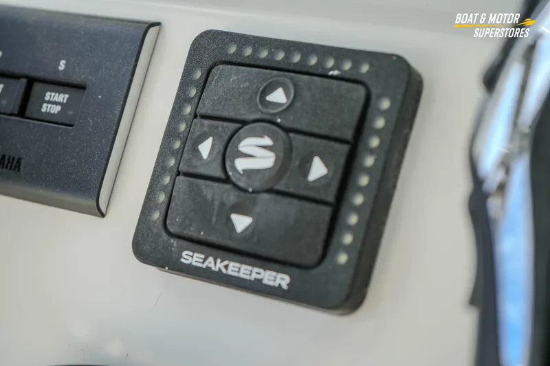 Slide: The Image of Control panel of a 2026 Key West 291 FS boat featuring Seakeeper system. - 28
