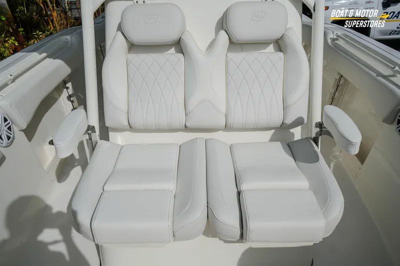 Slide: The Image of Luxurious seating on 2026 Key West 291 FS boat, featuring white cushioned upholstery. - 35