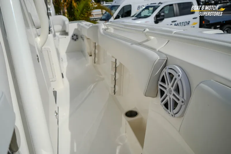 Slide: The Image of 2026 Key West 291 FS boat interior with speaker and seating detail. - 37