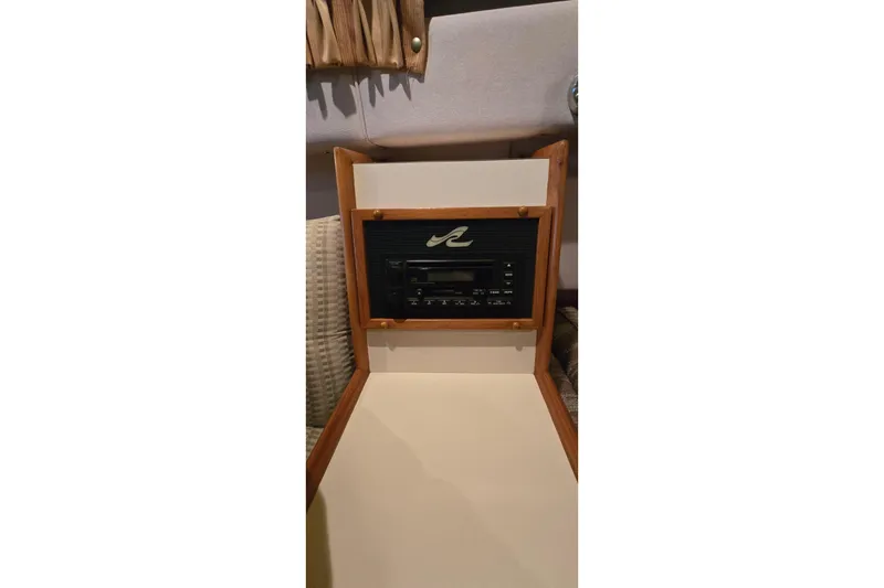 Slide: The Image of 1987 Sea Ray 340 Sedan Bridge interior with control console. - 27