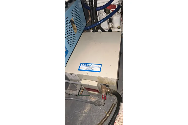 Slide: The Image of Engine compartment of 1987 Sea Ray 340 Sedan Bridge with Seaward marine equipment. - 43