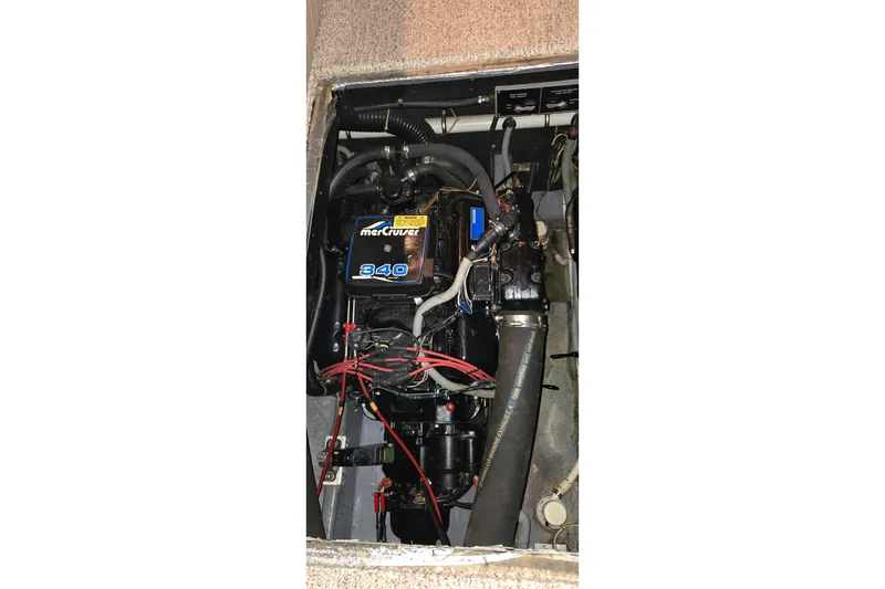 Slide: The Image of Engine compartment of a 1987 Sea Ray 340 Sedan Bridge with MerCruiser 340 engine. - 46