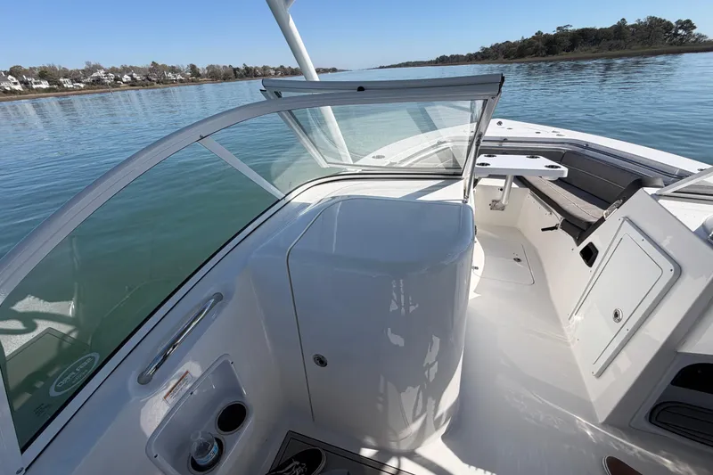 Slide: The Image of 2024 Sea Pro 240 Dual Console boat interior with open water view. - 28