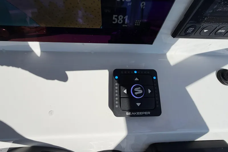 Slide: The Image of Control panel on 2024 Sea Pro 240 Dual Console boat dashboard. - 31