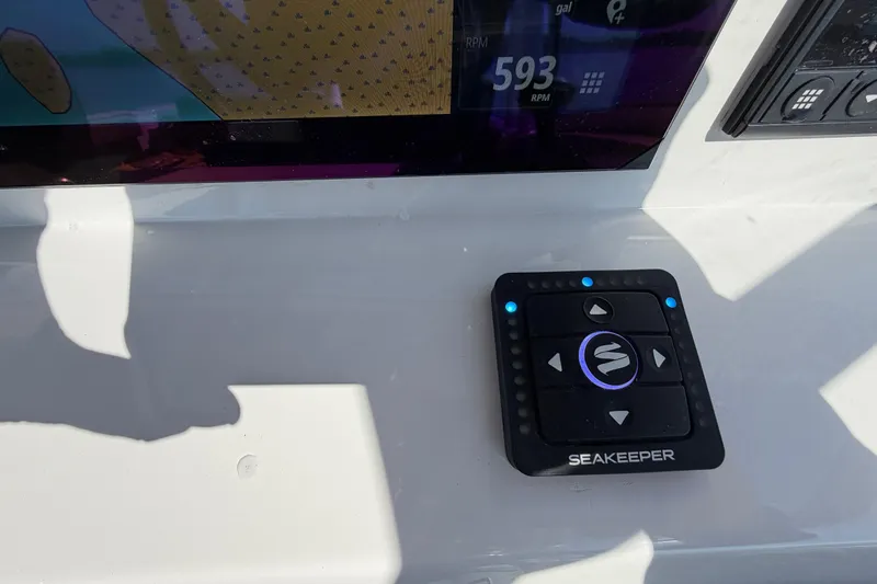 Slide: The Image of Control panel on 2024 Sea Pro 240 Dual Console boat dashboard with Seakeeper system. - 33