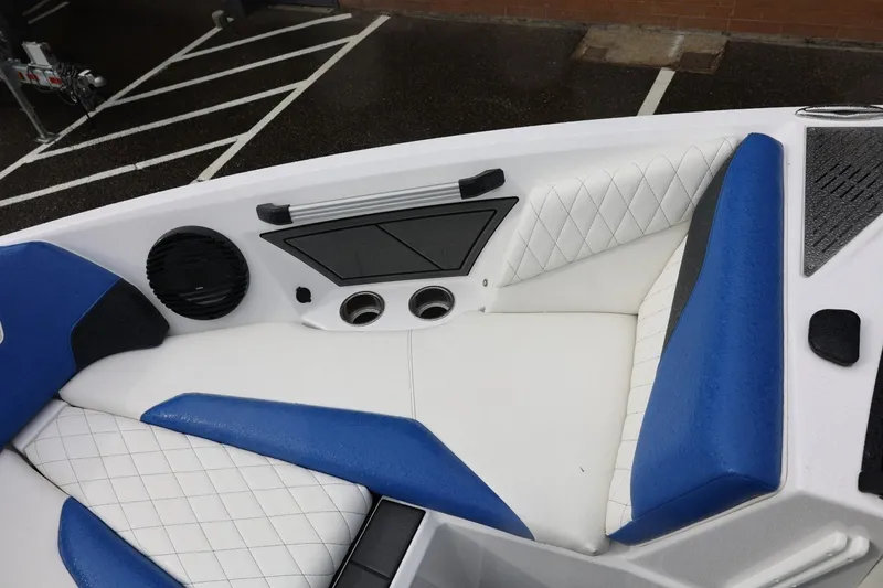Slide: The Image of Interior of 2023 Tigé Z3 boat with blue and white seating. - 38