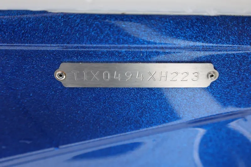 Slide: The Image of 2023 Tigé Z3 boat hull identification number on metallic blue surface. - 7
