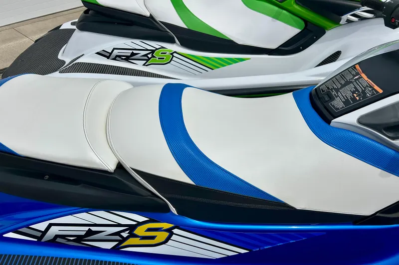 Slide: The Image of 2016 Yamaha WaveRunner FZS with blue and green accents, close-up of seat design. - 10