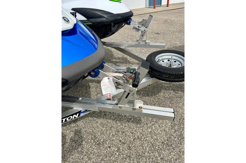 Slide: The Image of 2016 Yamaha WaveRunner FZS on a trailer, parked on asphalt. - 17