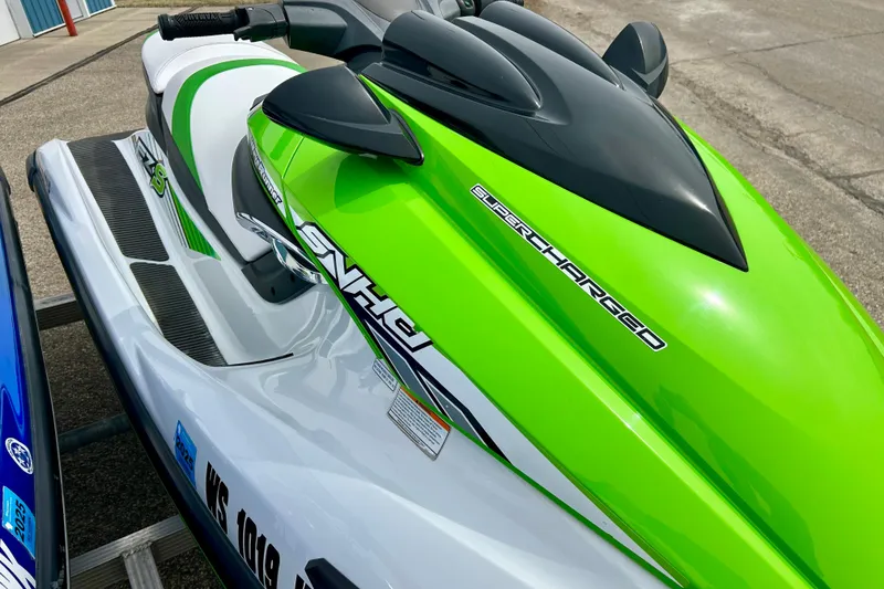 Slide: The Image of 2016 Yamaha WaveRunner FZS in vibrant green and white, parked on a trailer. - 25