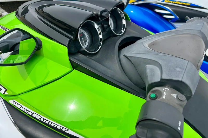 Slide: The Image of 2016 Yamaha WaveRunner FZS in vibrant green, featuring handlebars and dashboard controls. - 26