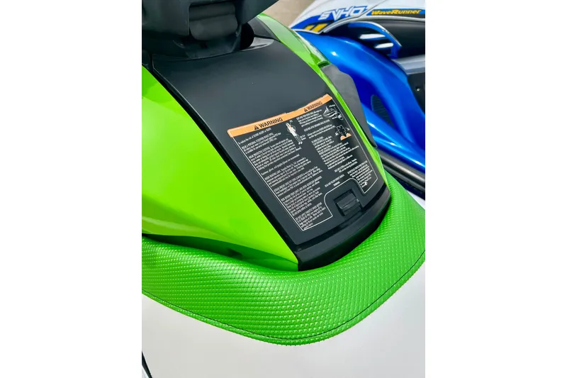 Slide: The Image of 2016 Yamaha WaveRunner FZS with vibrant green detailing and safety instructions. - 29