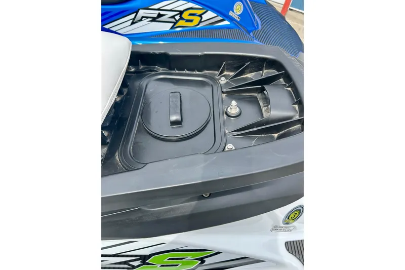 Slide: The Image of 2016 Yamaha WaveRunner FZS engine compartment detail with blue and white accents. - 32