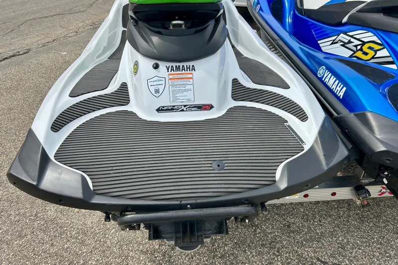 Slide: The Image of 2016 Yamaha WaveRunner FZS jet ski, featuring NanoXcel technology, parked on pavement. - 40