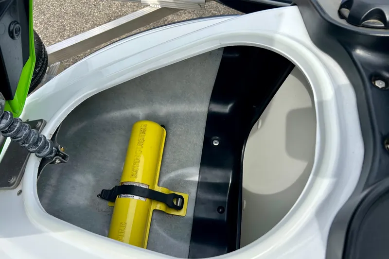 Slide: The Image of 2016 Yamaha WaveRunner FZS storage compartment with safety equipment inside. - 43