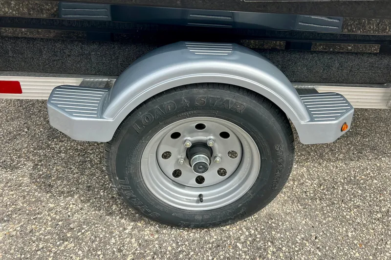 Slide: The Image of Trailer wheel and fender for 2016 Yamaha WaveRunner FZS on asphalt surface. - 8