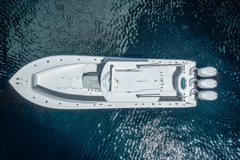 Slide: The Image of Aerial view of 2025 Yellowfin 36 Offshore boat on shimmering blue water. - 1