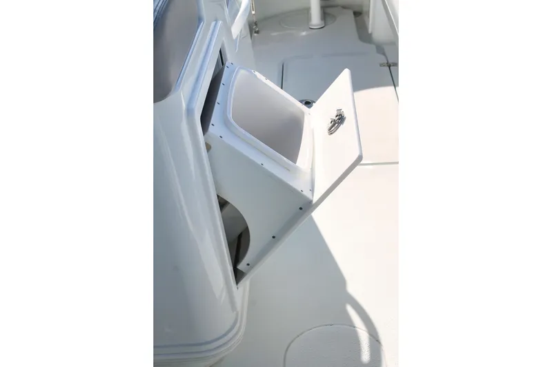 Slide: The Image of Open storage compartment on 2025 Yellowfin 36 Offshore boat deck. - 16