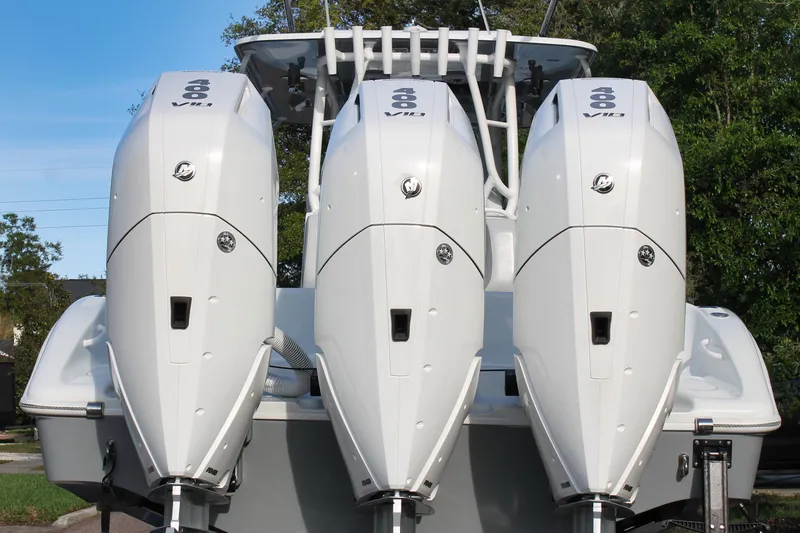 Slide: The Image of Triple outboard engines on a 2025 Yellowfin 36 Offshore boat, showcasing powerful performance. - 3