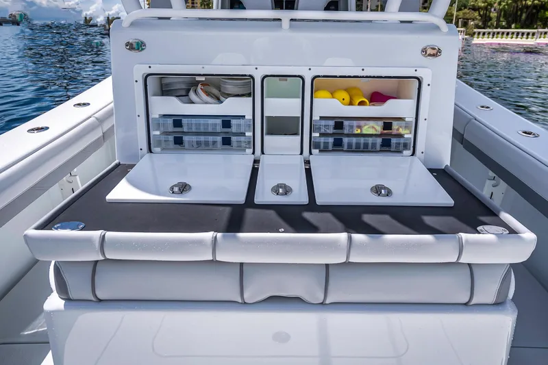Slide: The Image of 2025 Yellowfin 36 Offshore boat with organized storage compartments on deck. - 32