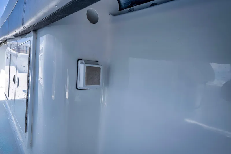 Slide: The Image of 2025 Yellowfin 36 Offshore boat interior detail with storage compartments. - 38