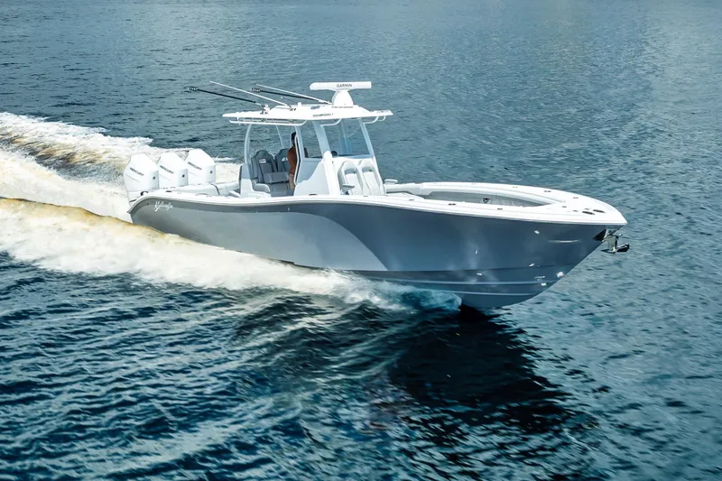 Slide: The Image of 2025 Yellowfin 36 Offshore boat cruising on open water. - 43