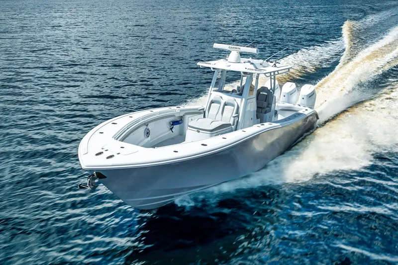 Slide: The Image of 2025 Yellowfin 36 Offshore boat cruising on open water. - 44