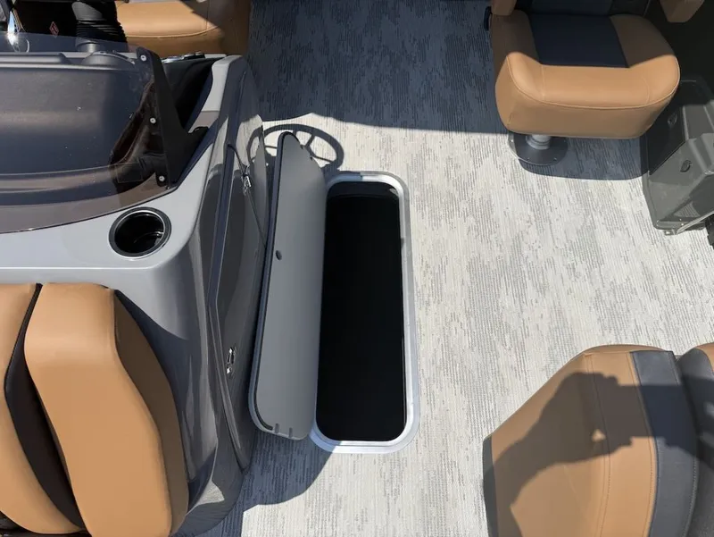 Slide: The Image of Interior of 2026 Sylvan L-3 LZ DH with open storage compartment. - 10