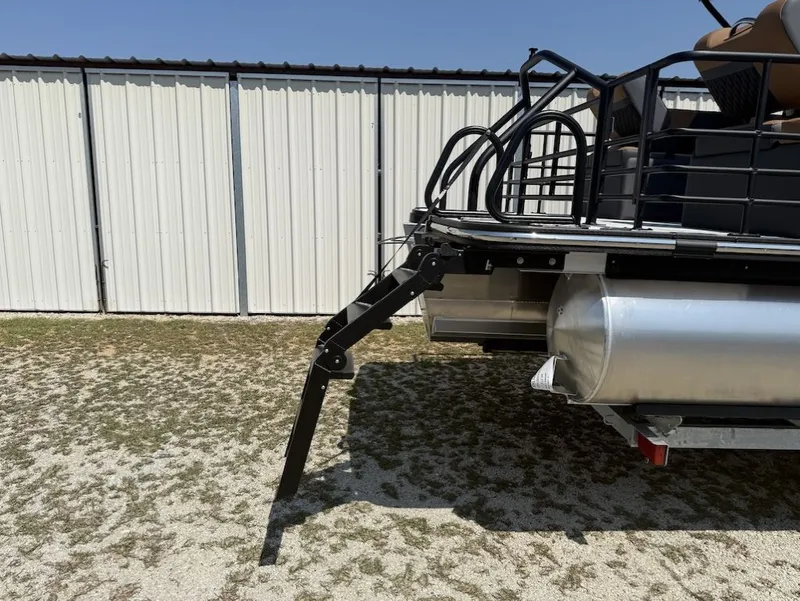 Slide: The Image of Sylvan L-3 LZ DH 2026 pontoon boat with ladder, side view. - 24