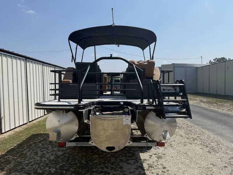Slide: The Image of 2026 Sylvan L-3 LZ DH pontoon boat, rear view with black canopy. - 4