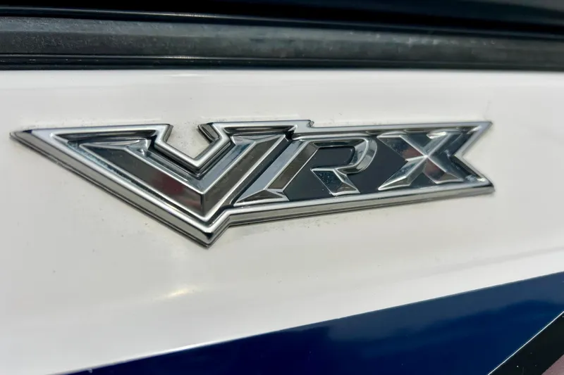 Slide: The Image of Close-up of 2017 Chaparral 203 Vortex VRX emblem on white surface. - 13