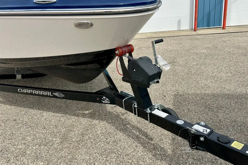 Slide: The Image of 2017 Chaparral 203 Vortex boat on trailer, close-up of hitch and front hull. - 25