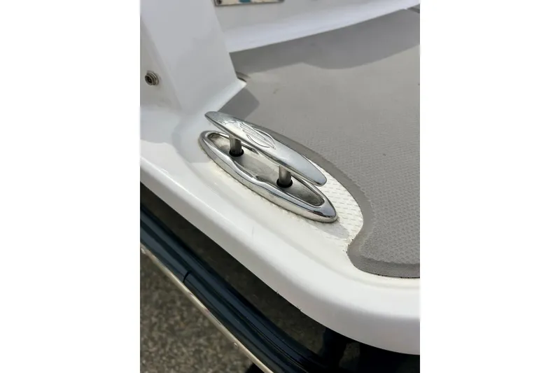 Slide: The Image of 2017 Chaparral 203 Vortex boat cleat on gray deck surface. - 29