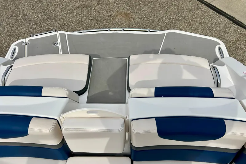 Slide: The Image of Rear seating area of 2017 Chaparral 203 Vortex boat with blue and white upholstery. - 30
