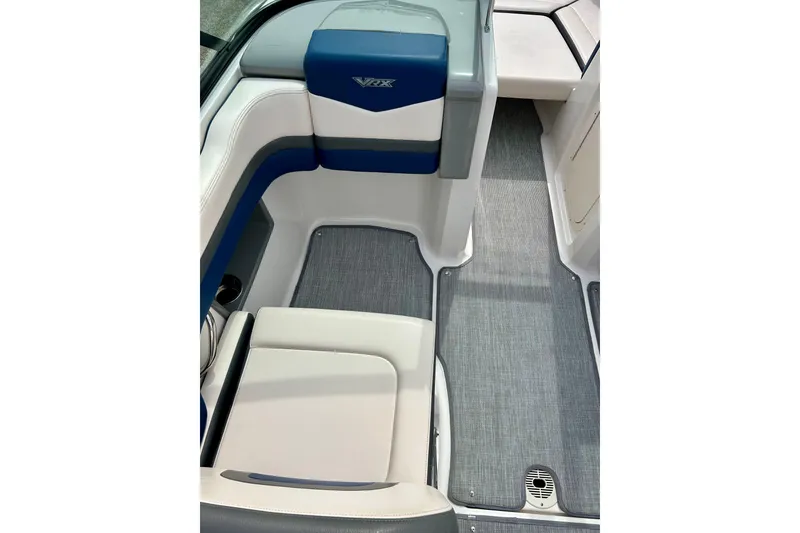 Slide: The Image of Interior of 2017 Chaparral 203 Vortex boat with blue and white seating. - 32