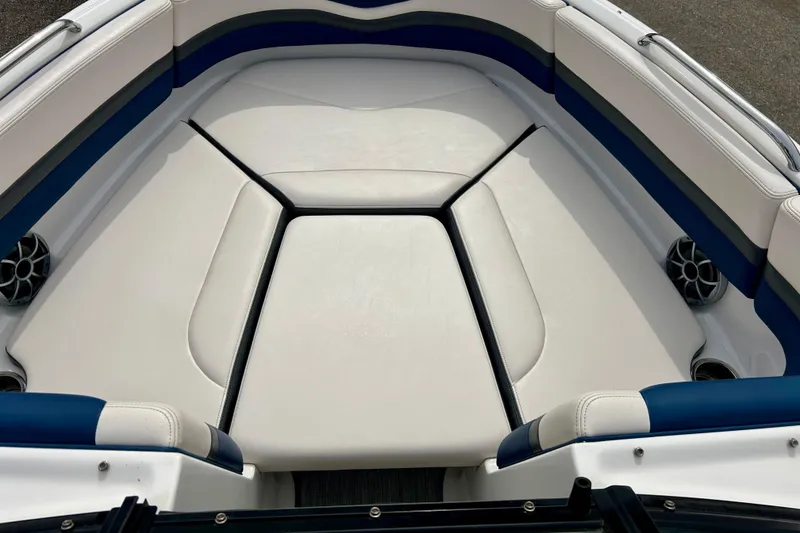 Slide: The Image of 2017 Chaparral 203 Vortex boat interior with white and blue seating. - 34