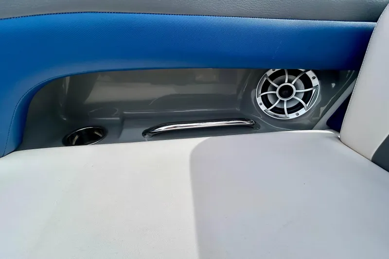 Slide: The Image of Interior of 2017 Chaparral 203 Vortex boat with speaker and cup holder. - 49