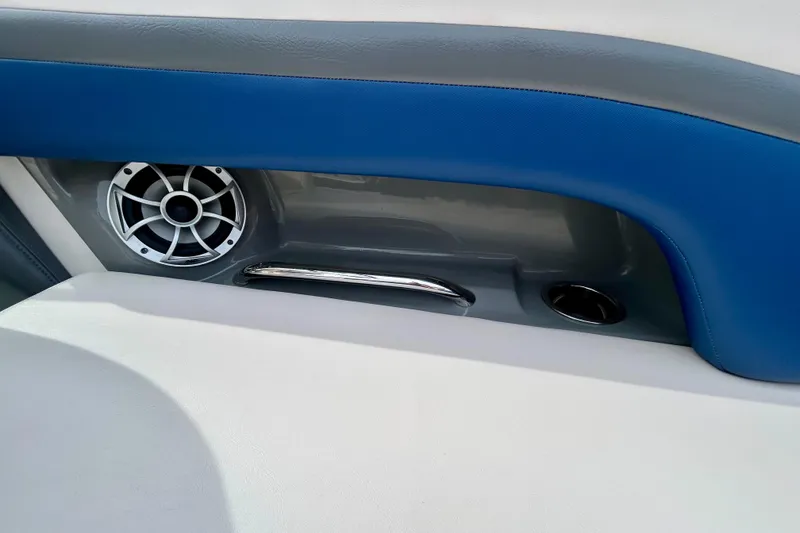 Slide: The Image of Interior detail of 2017 Chaparral 203 Vortex boat with speaker and blue upholstery. - 50