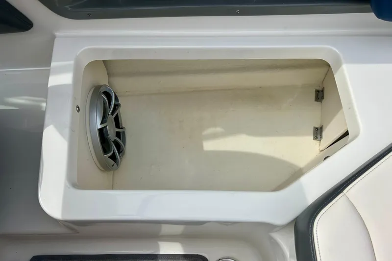 Slide: The Image of Storage compartment with speaker in 2017 Chaparral 203 Vortex boat. - 52