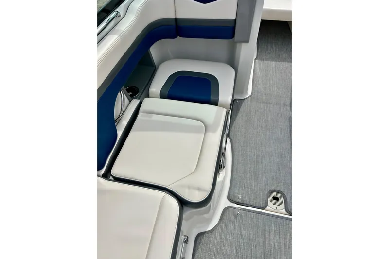 Slide: The Image of 2017 Chaparral 203 Vortex boat interior seating with blue and white upholstery. - 58
