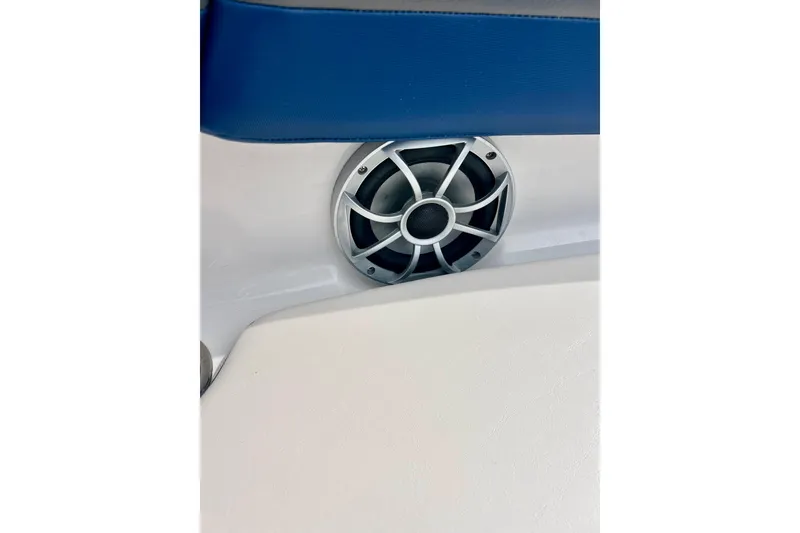 Slide: The Image of Speaker on 2017 Chaparral 203 Vortex boat interior with blue upholstery. - 63
