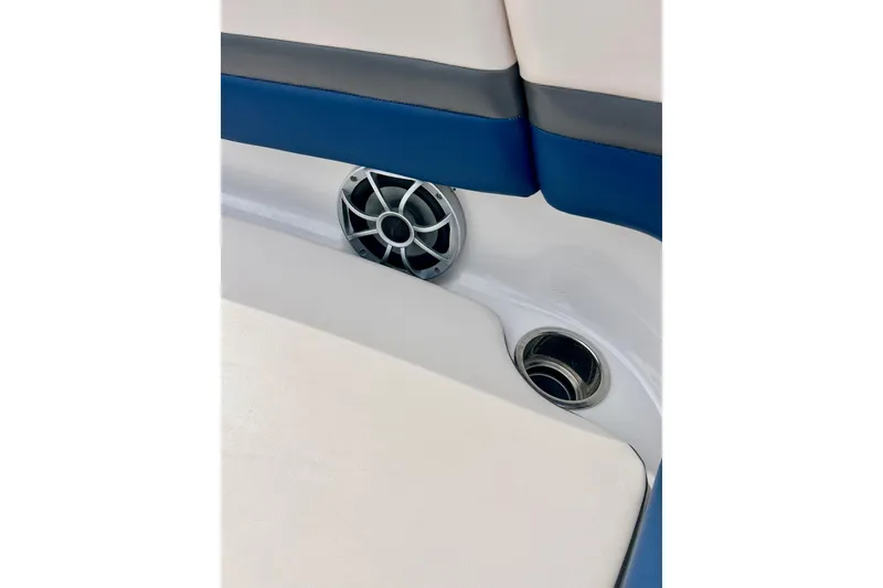 Slide: The Image of 2017 Chaparral 203 Vortex boat interior with speaker and cup holder. - 64