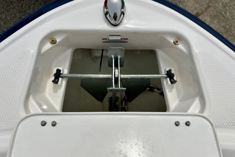 Slide: The Image of Anchor compartment of 2017 Chaparral 203 Vortex boat, featuring secure storage. - 69